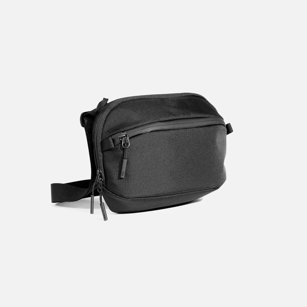 The black Aer Day Sling 3 Max crossbody bag in ballistic nylon, shown at a three-quarter angle