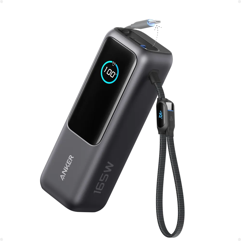 The Anker Laptop Power Bank in black with a 165W label, a bright status display reading 100 percent, and a retractable USB-C cable and braided carry-loop cable