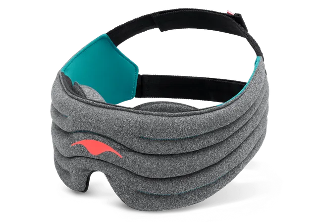 The Manta Weighted Sleep Mask, a contoured mask with weighted eye cups and adjustable head straps