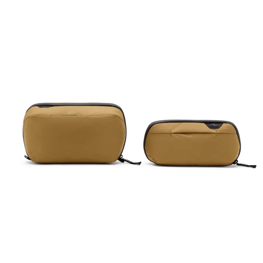 The Peak Design Wash Pouch in charcoal, a structured hanging toiletry kit with an integrated hook and internal shelf pockets