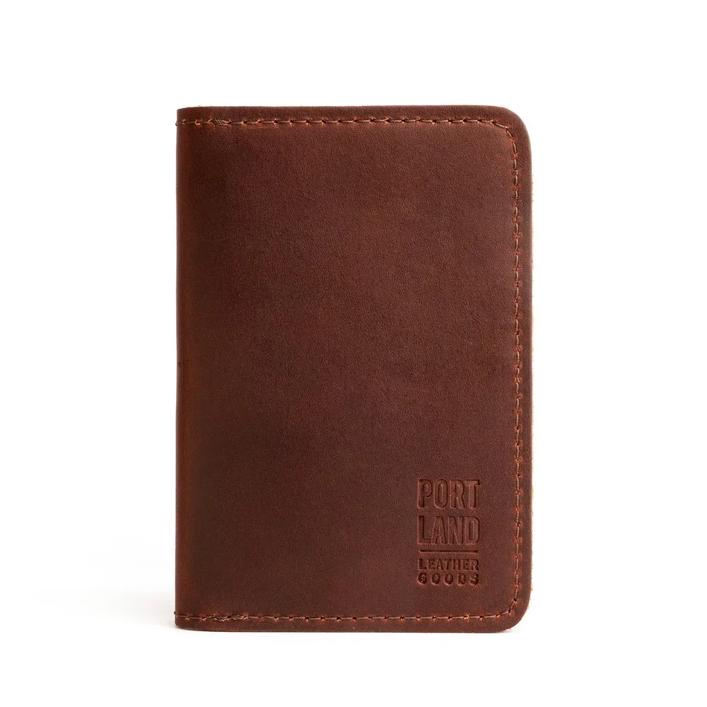 A full-grain leather Portland Leather Goods passport holder in cognac