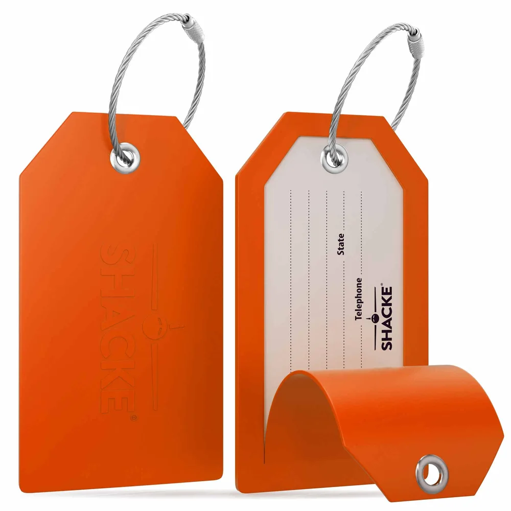 A set of two bendable rubber Shacke luggage tags with a privacy back cover and steel loops