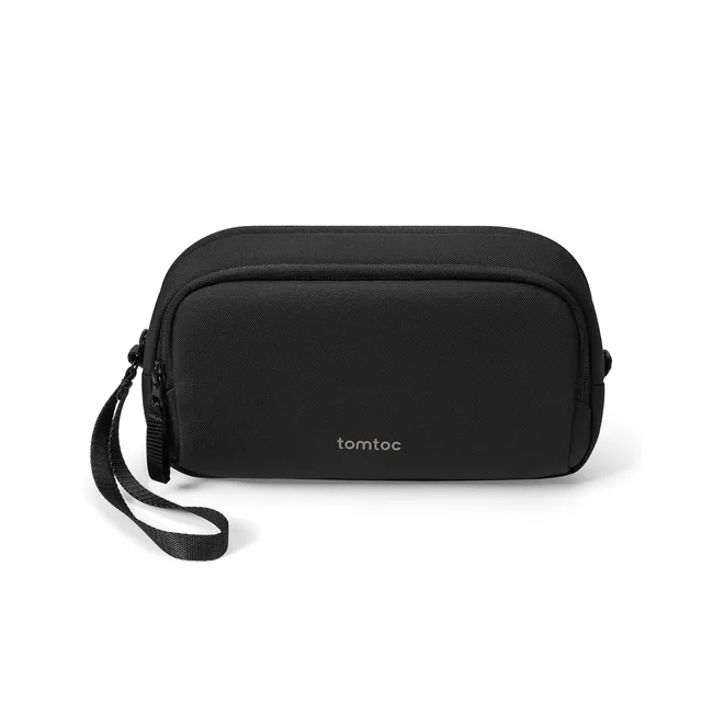 The Tomtoc Light-T12 electronic organizer in dark grey, a dual-compartment tech pouch that stands upright, opened to show cables under elastic loops
