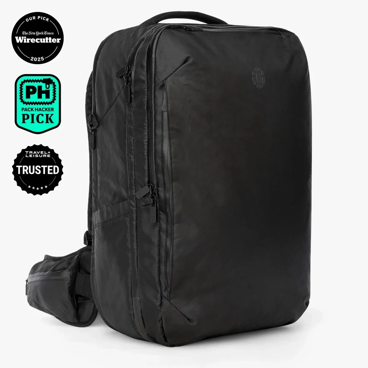 The Tortuga Travel Backpack 40L in black, a boxy carry-on travel backpack shown at a three-quarter angle