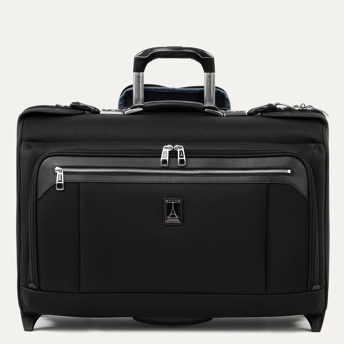 The Travelpro Platinum Elite rolling garment bag in black with a leather carry handle and a telescoping trolley handle