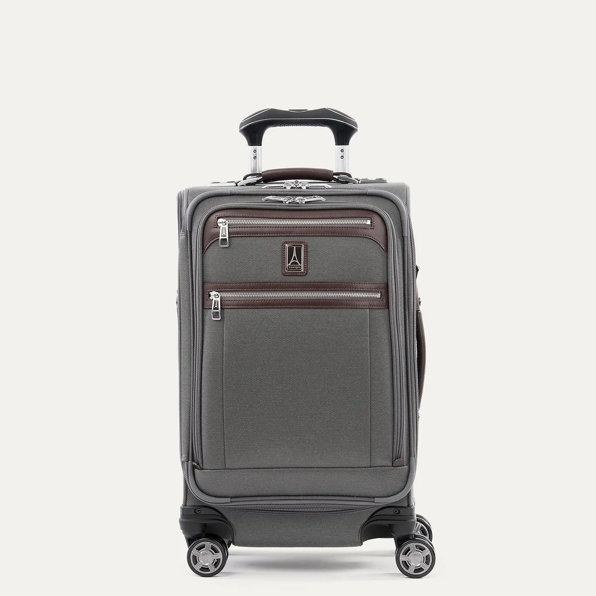 The Travelpro Platinum Elite carry-on spinner in grey, a softside bag with leather trim, front pockets, and four spinner wheels