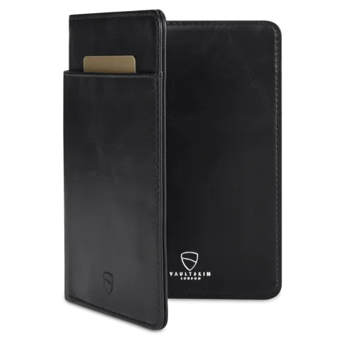 Black leather Vaultskin Kensington passport wallet with a card popping out of a side slot